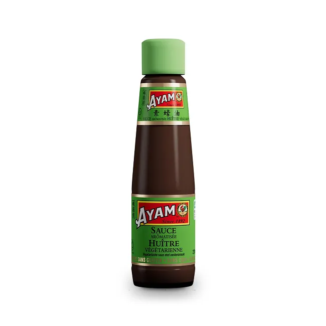 La boutille de Ayam avec une étiquette verte, le logo rouge et le gros bouchon en plastique vert pomme.