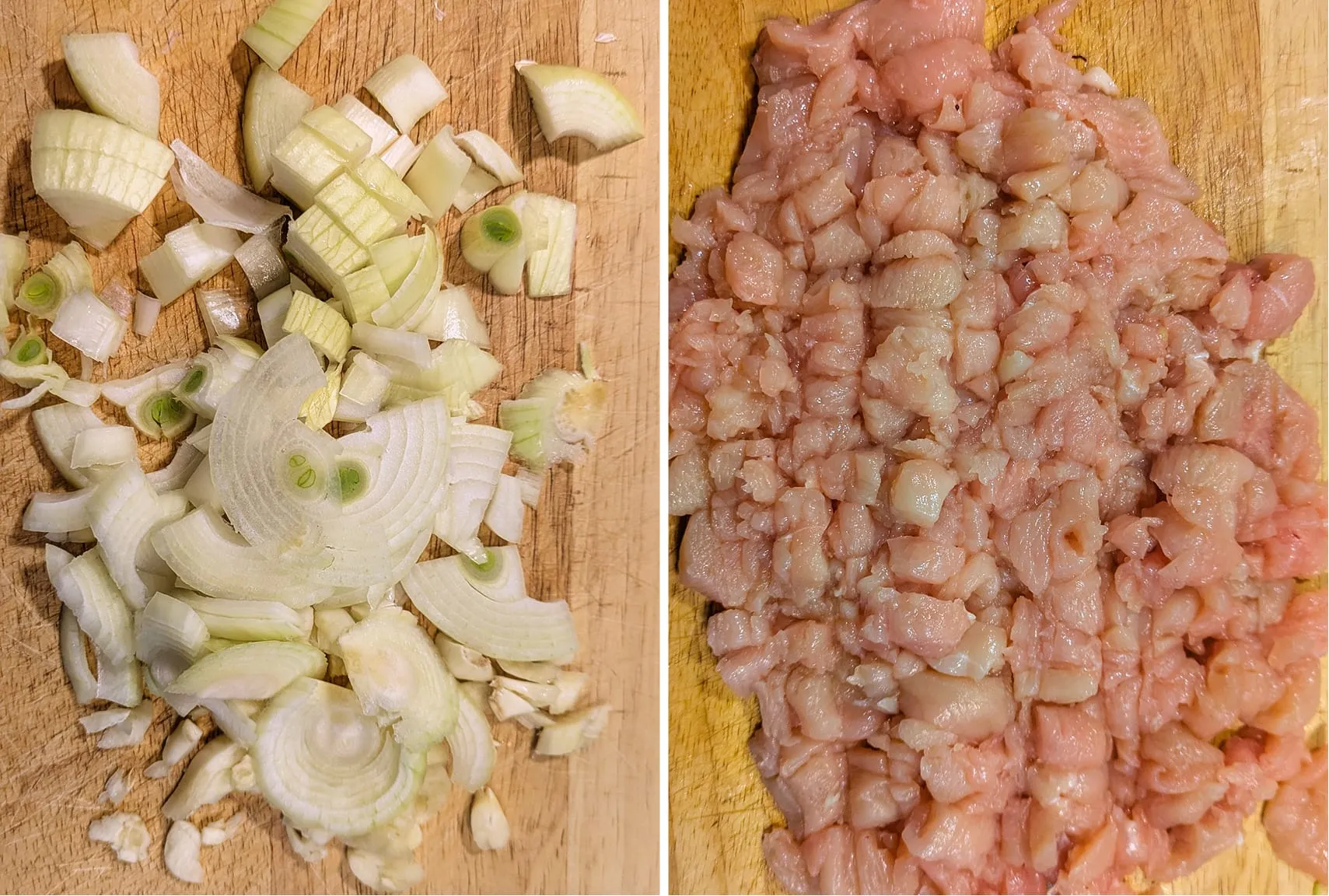 Ail et oignon émincés sur une planche à côté du poulet coupé en dés.